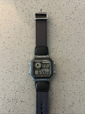 Casio Digital World Time Illuminator Watch - Black and Silver